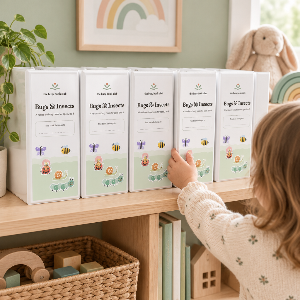 The Theme Library binders on a playroom shelf